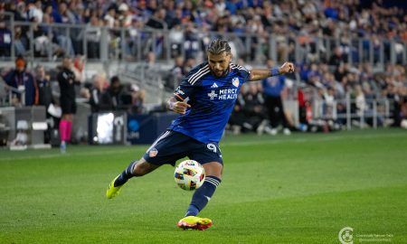Deandre Yedlin sends in a cross. Photo courtesy Megan Lee