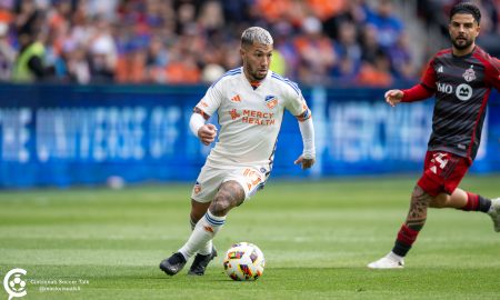 Luciano Acosta dribbles against Toronto FC. Photo courtesy of Brian Mack.